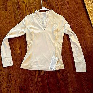 Lululemon it’s rulu run 1/2 zip new with tags size 8 cream